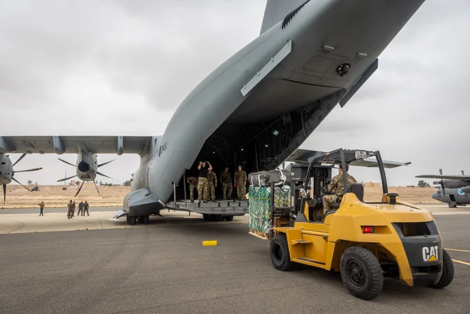 Aid being loaded onto the back of the Atlas.