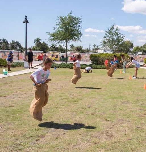 Kids participating in sack race