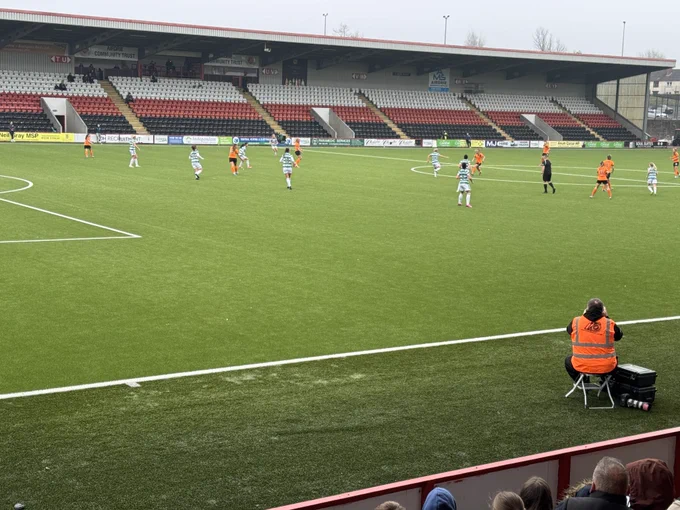 A view of the game from the stands at the Excelsior with Celtic and Glasgow City players on the pitch