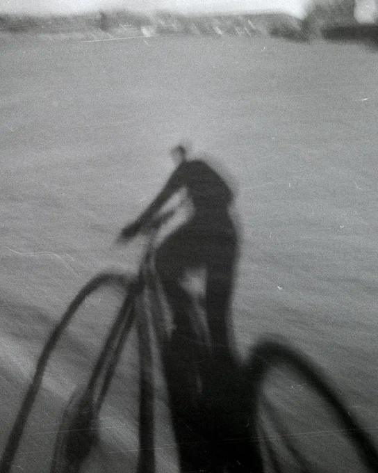 Black and white shadow selfie whilst riding a bike