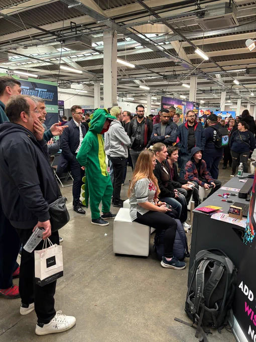 Crowd gathered around Outrage: Fight Fest booth at WASD.