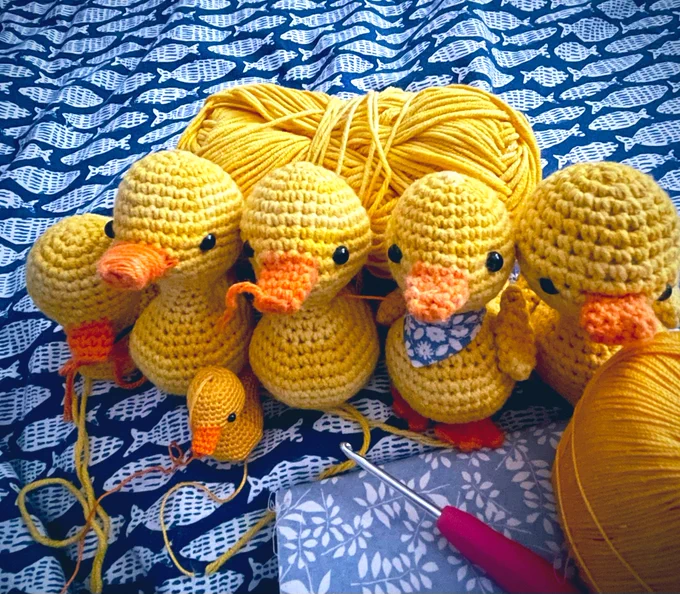A collection of crocheted ducks.