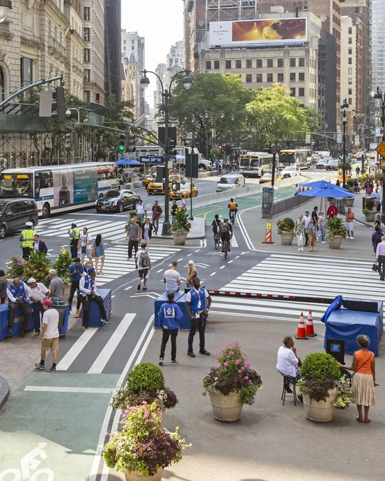 An overhead photo of Herald Square include expanded pedestrian space, bike lanes and vehicle lanes. 