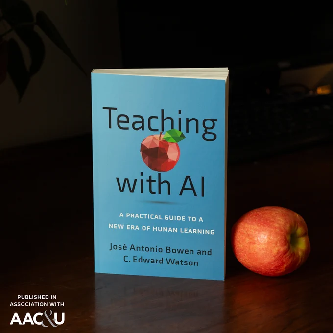 The book "Teaching with AI" on a dark wooden desk, adjacent to a red apple. The AAC&U logo appears in the lower left corner.
