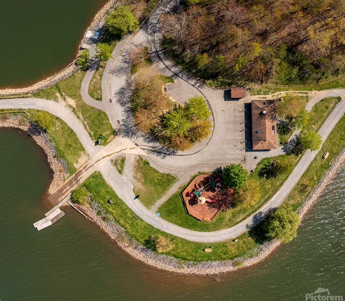 Aerial view looking straight down on the childrens play park at Cheat Lake Park near Morgantown West Virginia on a beautiful calm spring morning