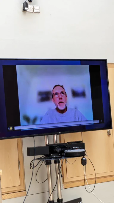 Nick Barnes visible on video call with Lee Crothers discussing their new book
