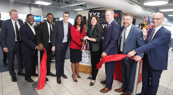 Ribbon-cutting celebrating launch of direct daily flight service from #STL-#YUL @flystl 