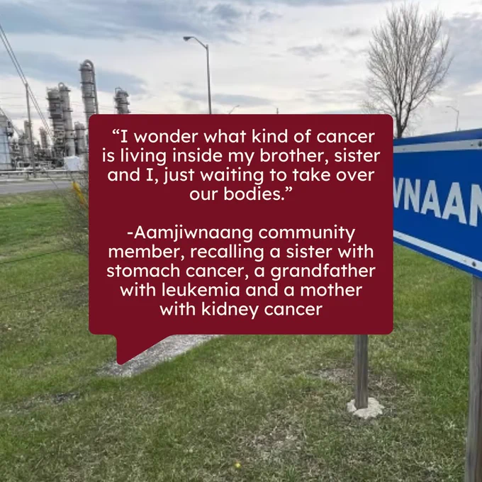 White text in a red speech bubble reads ““I wonder what kind of cancer is living inside my brother, sister and I, just waiting to take over our bodies.” -Aamjiwnaang community member, recalling a sister with stomach cancer, a grandfather with leukemia and a mother with kidney cancer”. The background is a photo of the Aamjiwnaang sign, with a chemical plant in behind.