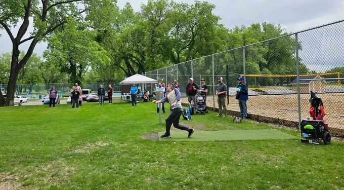 People watch a player making a throw from a tee pad during the 2023 Spring Fling disc golf tournament in Swift Current.
Photo courtesy of CMHA Swift Current