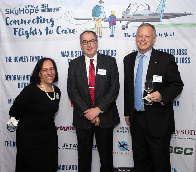 NORD's Ed Neilan posing with leaders of PALS SkyHope at their Connecting Flights to Care conference in Boston.