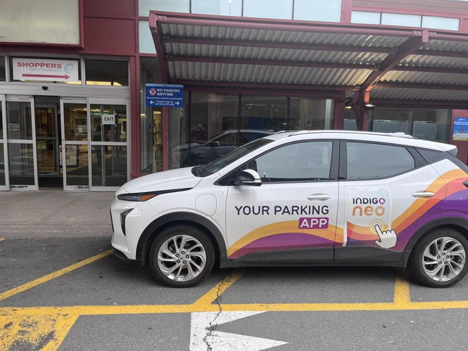 Illegally parked Indigo Parking car blocking accessible access to NSHA facility in Halifax.