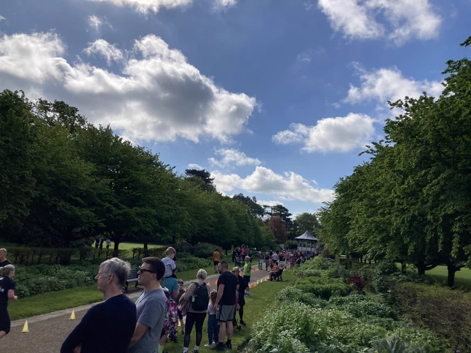 A park boulevard under nearly clear skies