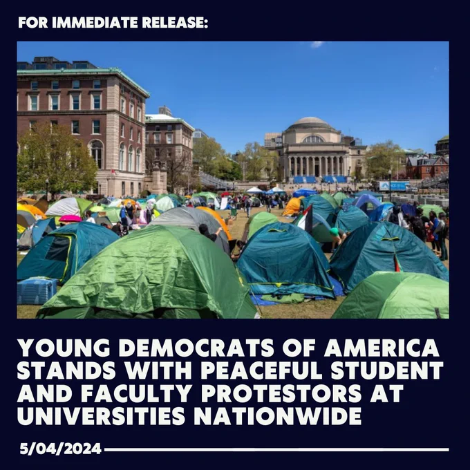 A crowded tent city set up by protestors on a university campus with classical architecture buildings in the background under a clear blue sky. The image is overlaid with text announcing the support of Young Democrats of America for peaceful student and faculty protests.