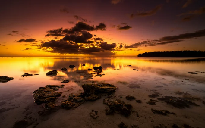 https://unsplash.com/photos/the-sun-is-setting-over-a-body-of-water-PQlDvRWbuIo
