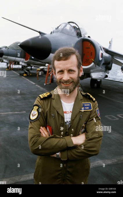 Lieutenant Commander 'Sharkey' Ward, 801 Harrier Squadron, stands in front of his aircraft aboard HMS Hermes as she and the rest of the Task Force sailed south to the Falklands.
Martin Cleaver, PA Images / Alamy Stock Photo, 20 April 1982, Image ID: G9R16X