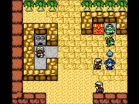 Screenshot of Dragon Warrior Monsters 2. A young boy wearing a blue hat has two monsters following him: a little blue slime, and a walking cactus. They're in a desert town; most of the townspeople are wearing turbans.