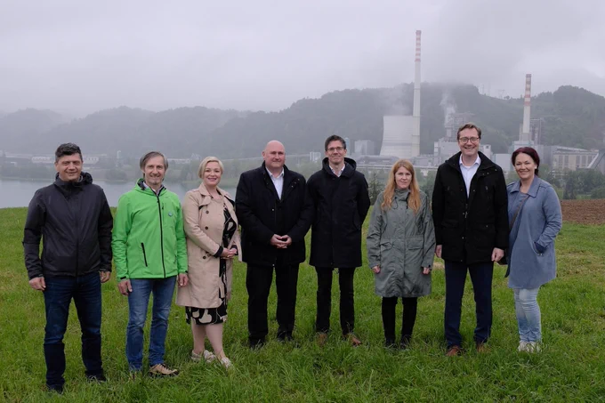 Group photo in front of the power plant