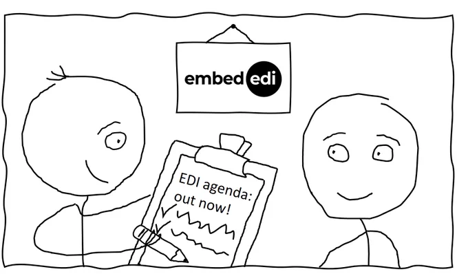 Two people at a clipboard discussing an EDI research agenda
