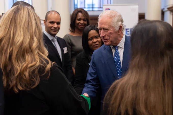 His Majesty The King greeting guests at an event.