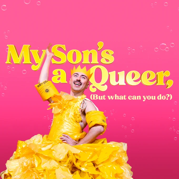 A pink background with yellow text saying My Son's A Queer (but what can you do) - Rob Madge is smiling in a yellow dress and yellow swimming armbands