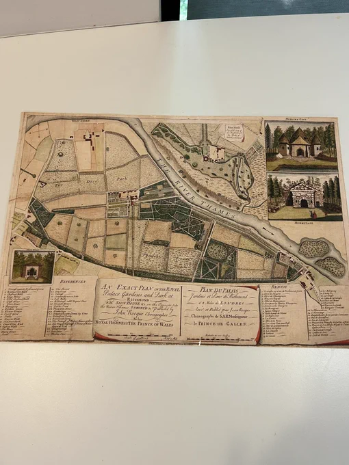 Old map showing Kew Gardens. The bottom is mainly text telling you which numbers on the map mean which place. In the top right corner there are two small drawings of buildings that used to be on the site.