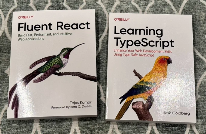The books "Fluent React: Build Fast, Performant, and Intuitive Web Applications" by Tejas Kumar and "Learning TypeScript: Enhance Your Web Development Skills Using Type-Safe JavaScript" by Josh Goldberg.
