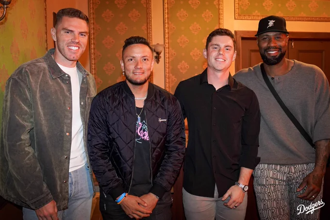 A photo of Freddie Freeman, Miguel Rojas, Will Smith and Jason Heyward.