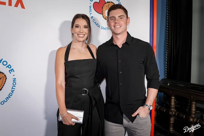 A photo of Will and Cara Smith at their comedy night carpet.