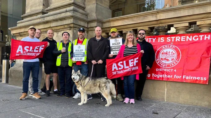 pickets and supporters in front of Newcastle Central