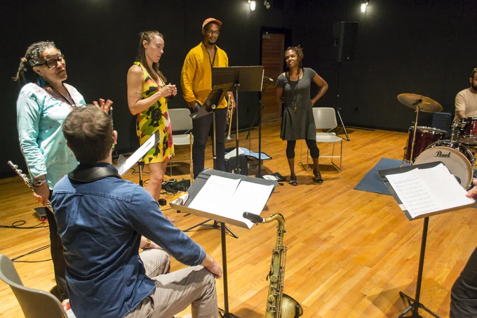 ACA Mentoring Artist-in-Residence in Music Composition, Nicole Mitchell working with Associate Artists-in-Residence in Music Composition in Atlantic Center for the Arts’ Joan James Harris Theater.