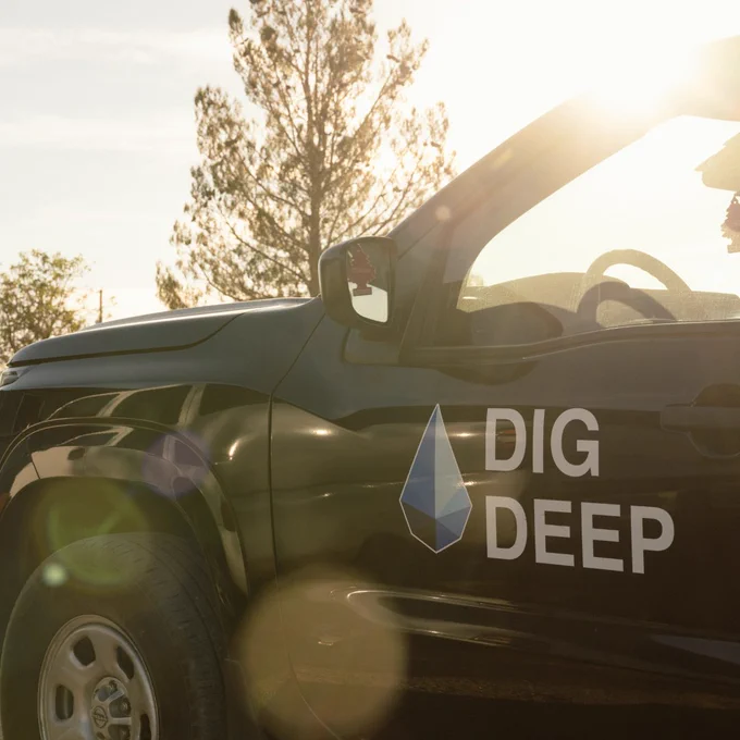 Photo of truck with DigDeep logo on door.