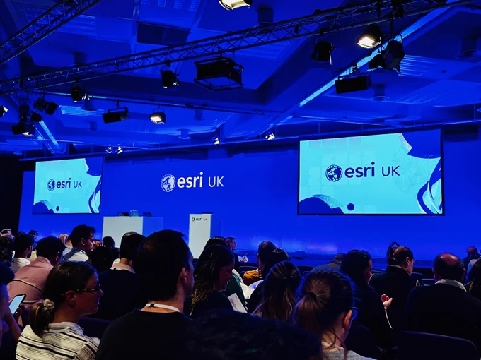 Photograph of the stage before the opening plenary of the ESRI Annual Conference 2023.