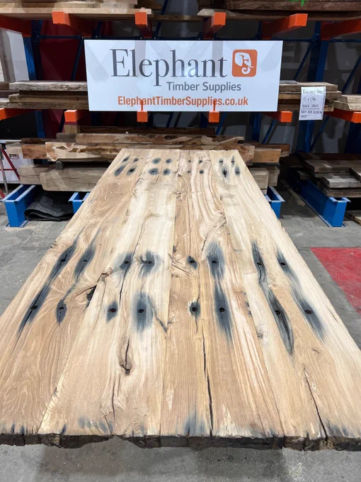 photo of rustic Oak table top made from train sleepers.