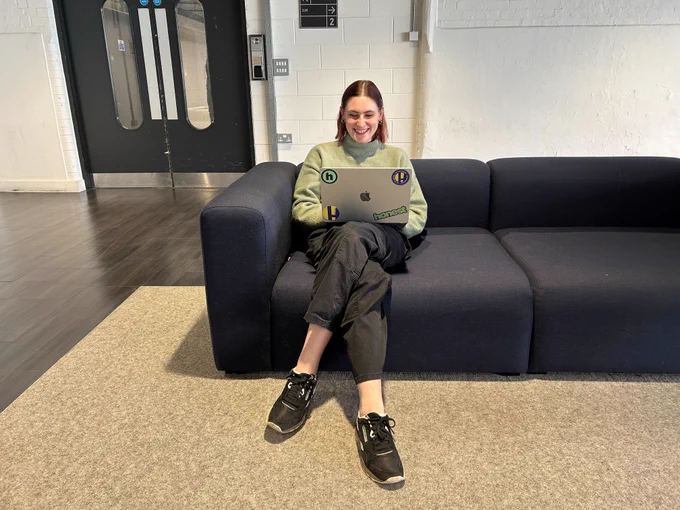 Anna with an Honest branded laptop
