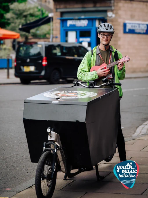 YMI Tutor Malcom with an e-cargo bike, ready to transport ukulele's to Edinburgh schools.