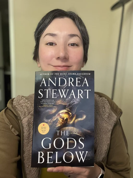 Me holding an ARC of THE GODS BELOW