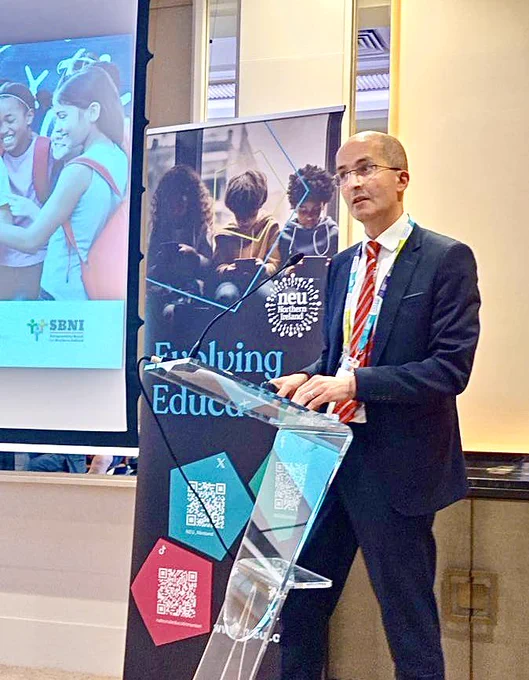 Noel Purdy speaking at the NEU conference