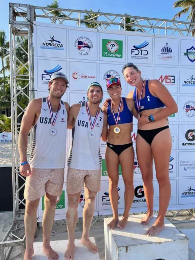 On the podium: Wyatt Harrison and Evan Cory with their silver medals and Hailey Harward and Kylie Deberg with gold