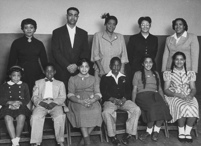  Students and their parents who initiated the landmark Civil Rights lawsuit 'Brown V Board of Education,' Topeka, Kansas, 1953, Pictured are, front row, from left, students, Vicki Henderson, Donald Henderson, Linda Brown James Emanuel, Nancy Todd, and Katherine Carper; back row, from left, parents Zelma Henderson, Oliver Brown, Sadie Emanuel, Lucinda Todd, and Lena Carper. (Photo by Carl Iwasaki/The LIFE Images Collection via Getty Images)


