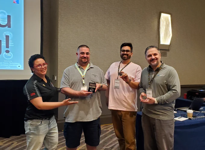 Posing with top three winners showing off their challenge coins