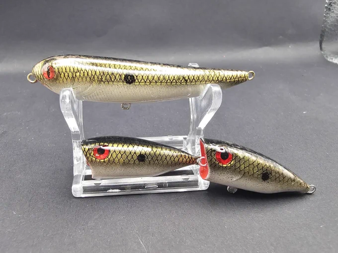 Signature pattern called Abalone Shad.  It gets it name from the belly. Alot of shifters in it. Made in a 3 in micro pencil and micro poppers.