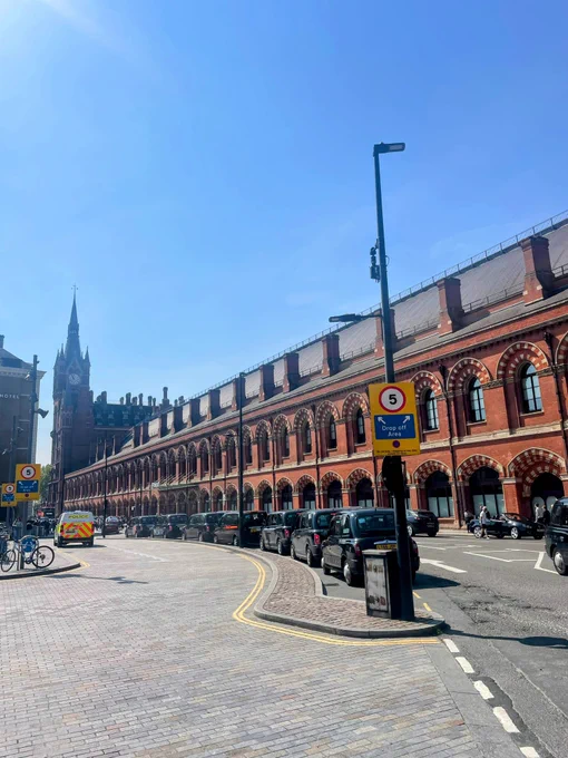 The delightful St Pancras station, taken from outside. Featuring lovely red brick work and clock tower