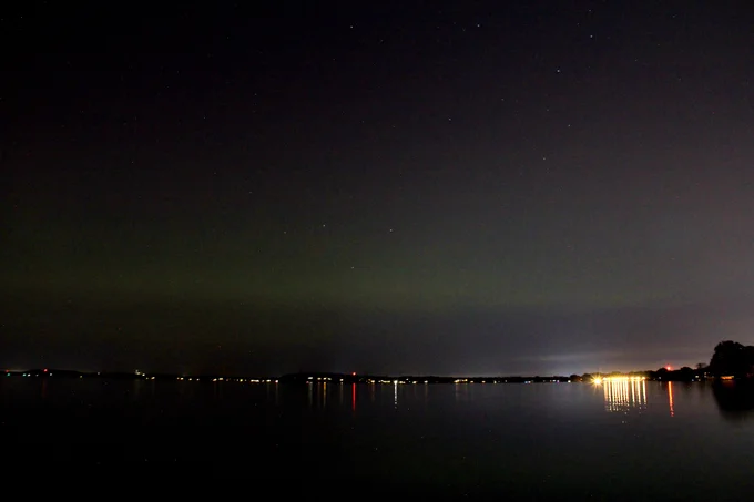 A faint green aurora over Lake Mendota.