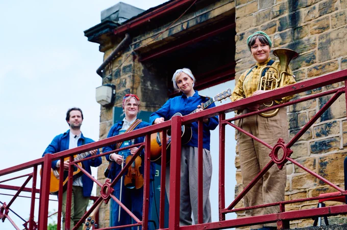 The folk troupe band of musicians.