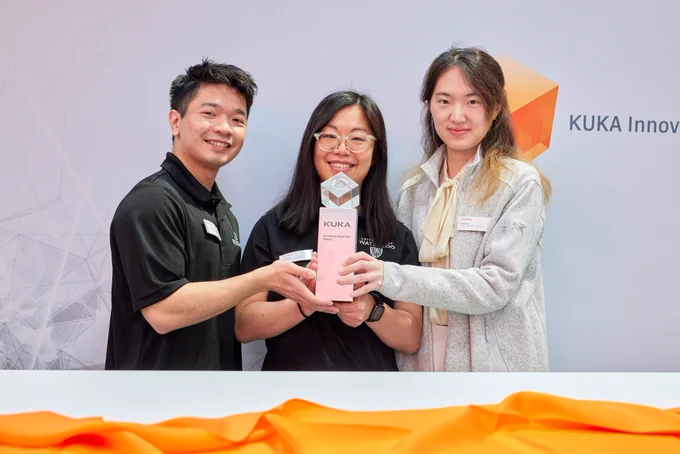 Photo of the team carrying their finalist prize
