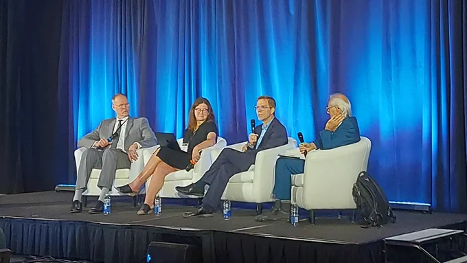 Dr. Adalsteinn Brown, a white man with short grey hair. Dr. Kim McGrail, a white woman with long brown hair. Dr. Robert Reid, a white man with short hair and glasses. Dr. Denis Roy, a white man with white hair and glasses. 