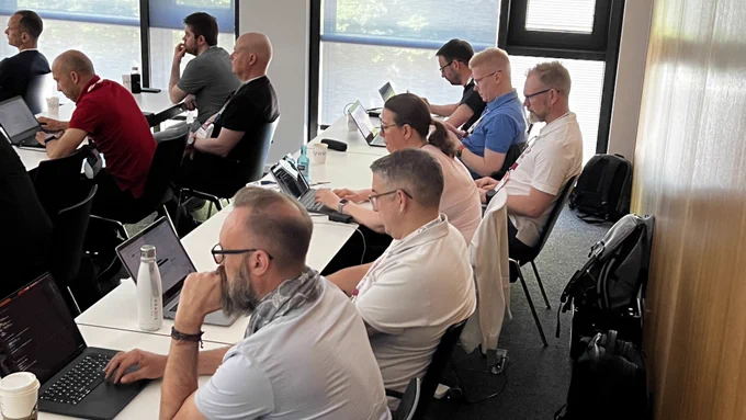 Some of the trainers for the dev tutorial preparing for their modules later in the day.
