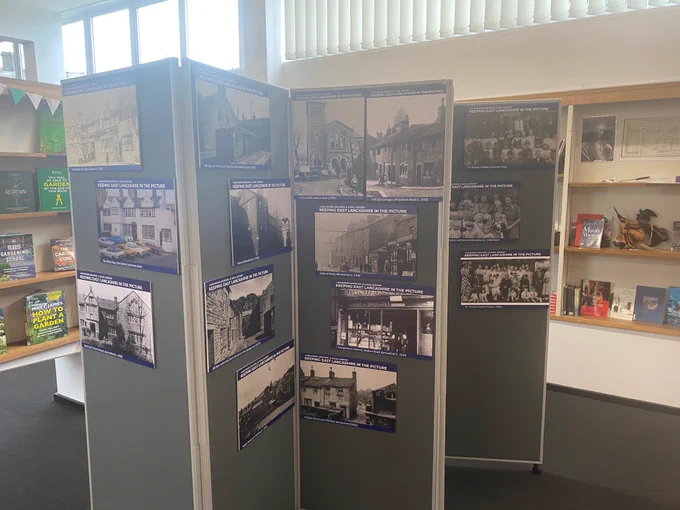 Colour photograph showing one side of the exhibition panels with photographs of Barrowford
