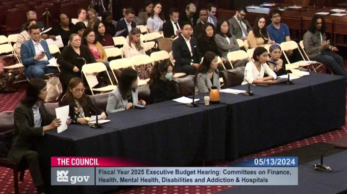 A photo of Asian American Federation's Associate Director of Programs Daphne Thammasila testifying at the New York City FY25 Executive Budget Hearing: Committees on Finance, Health, Mental Health, Disabilities and Addiction & Hospitals