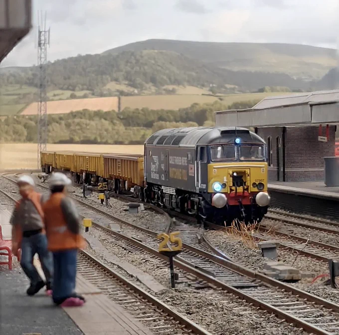 Photograph of a model of a ballast train passing Colwick Park station